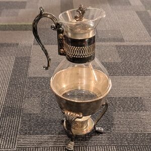 Elegant Silver and Glass Pitcher